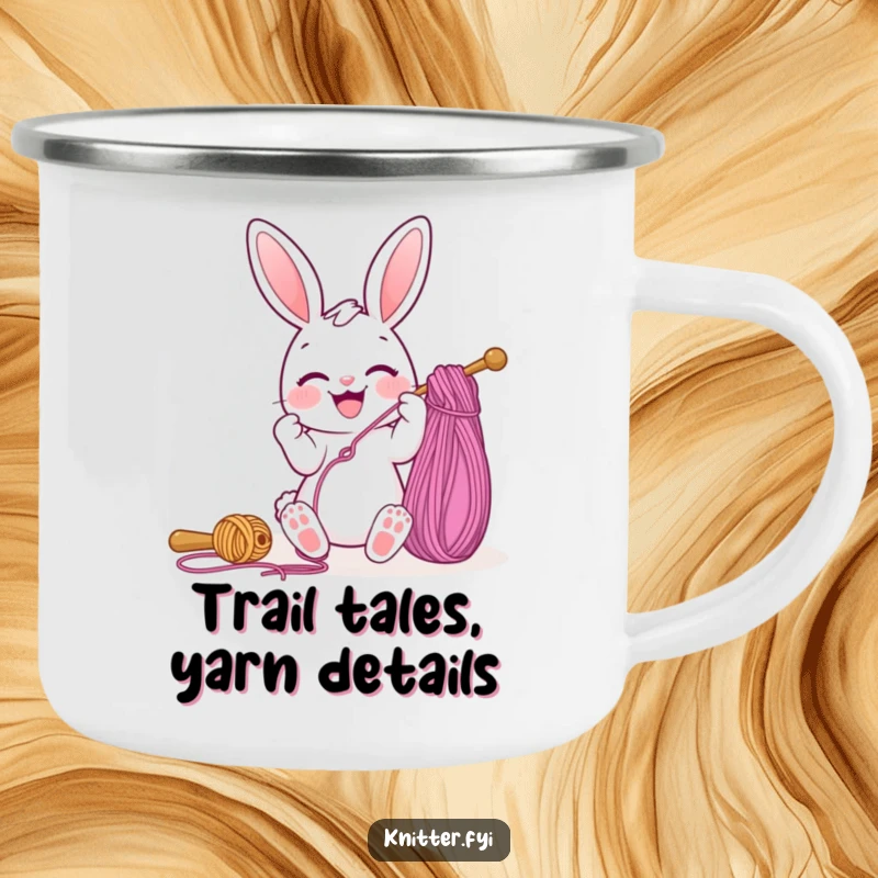 Funny camping mug with a joyful bunny character threading a giant sewing needle with yarn, perfect for outdoor crafters and adventurers.