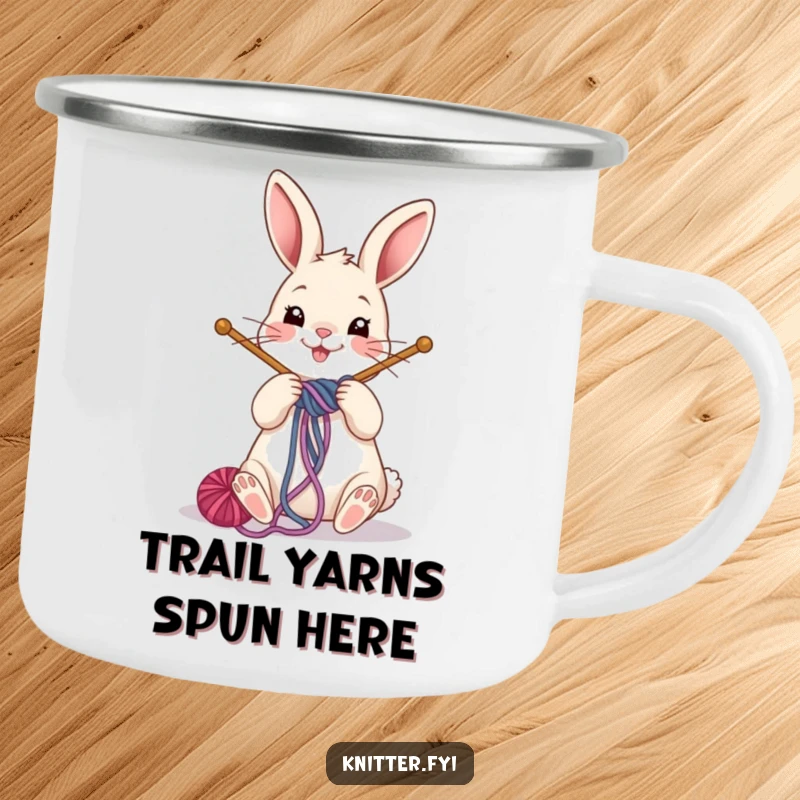 Funny rabbit camping mug showing a cheerful bunny winding yarn around knitting needles, designed for crafters on the move.