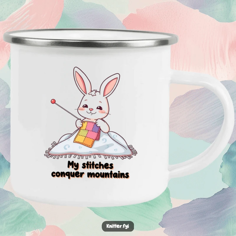 Funny camping mug with a happy rabbit character sewing a patch on a blanket, ideal for outdoor crafting enthusiasts.