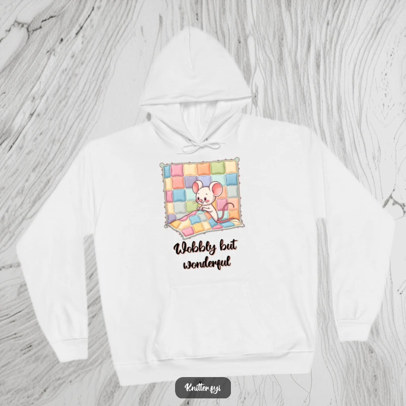 Funny Kawaii mouse in a hoodie, giggling while sewing colorful patches onto a quilt, a warm and humorous design.