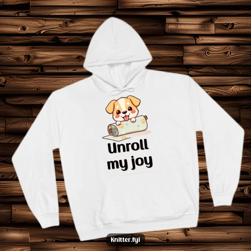 Funny Hoodie featuring a happy dog unrolling a roll of patterned fabric, designed for comfort and playful spirit.