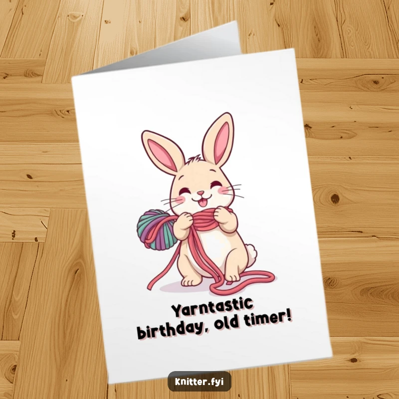 Funny Free Printable Birthday Card: A happy rabbit tangled in colorful yarn, ready for a good laugh.